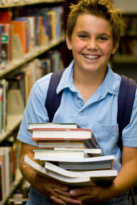 Boy with Books & Learning Disorder